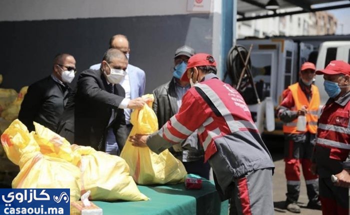 عمالة الفداء مرس السلطان :توزيع معونات غدائية على عمال النظافة